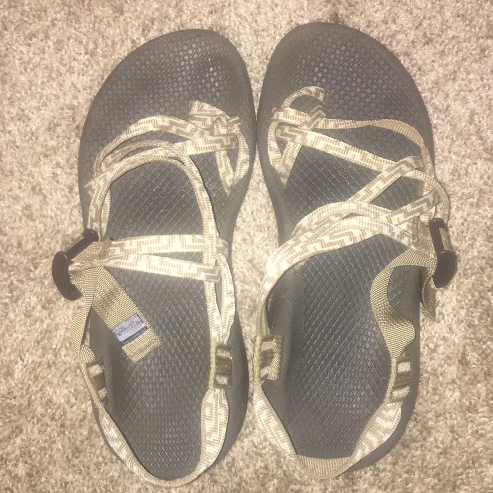 Tan designed chacos. Barely worn great condition!!